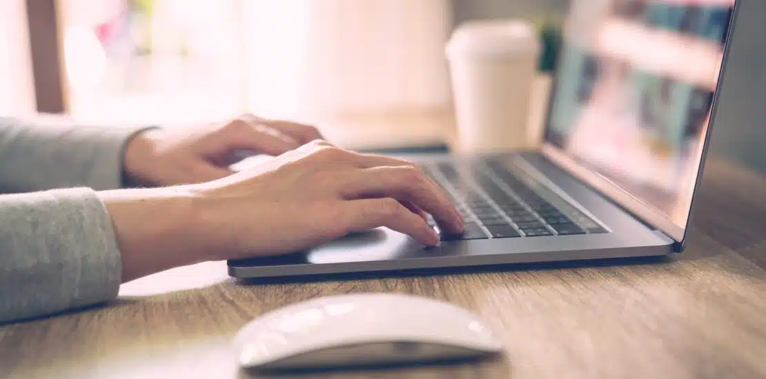 business-woman-using-laptop-computer-online-activity-wood-table-home-office