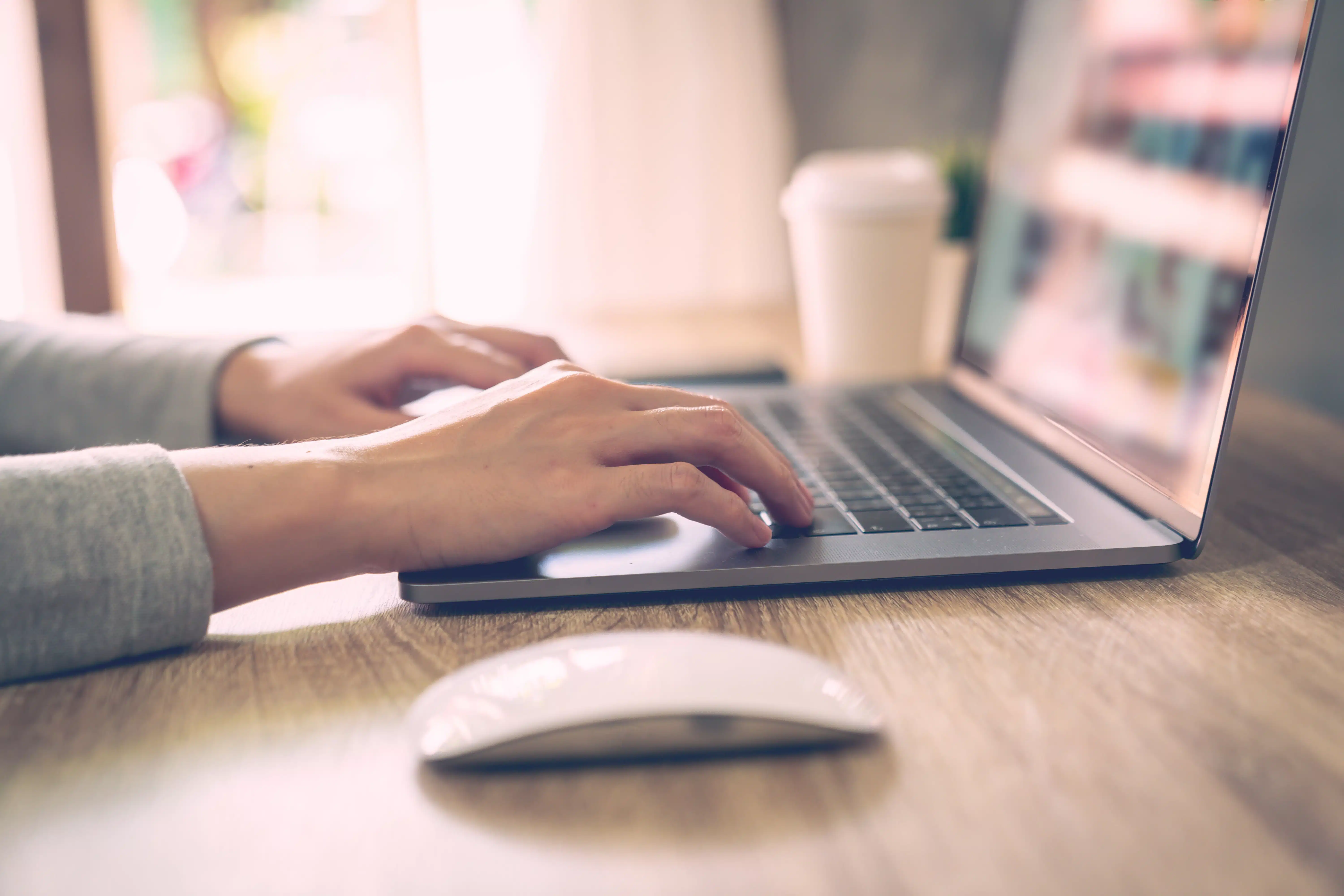 business-woman-using-laptop-computer-online-activity-wood-table-home-office