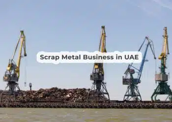 pier-lies-large-pile-metal-scrap-intended-loading-into-vessel-by-using-cranes-min